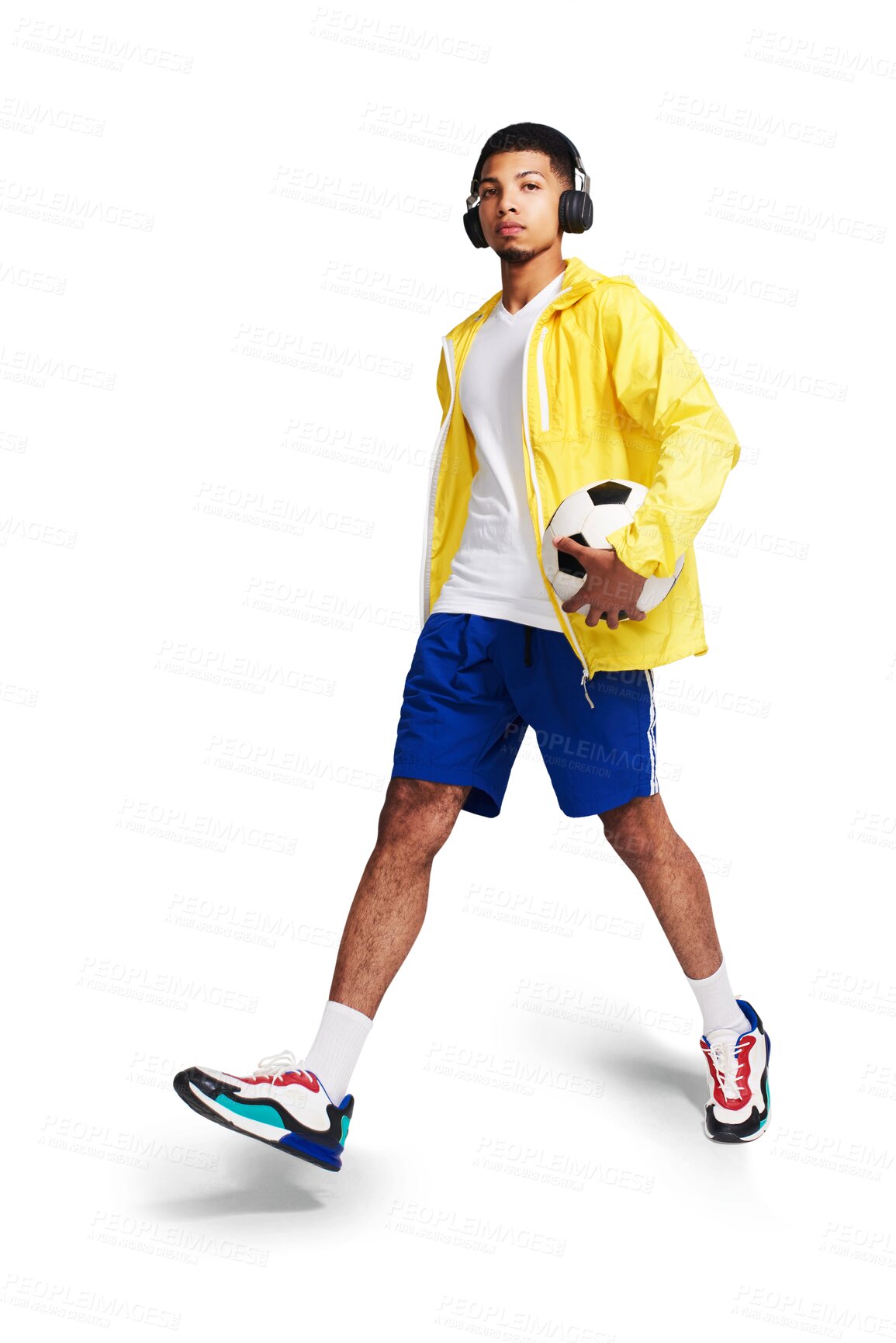 Buy stock photo Isolated man, soccer ball and headphones in portrait, walk and music by transparent png background. Young football player, focus and listening with audio tech for streaming service, mindset or sports