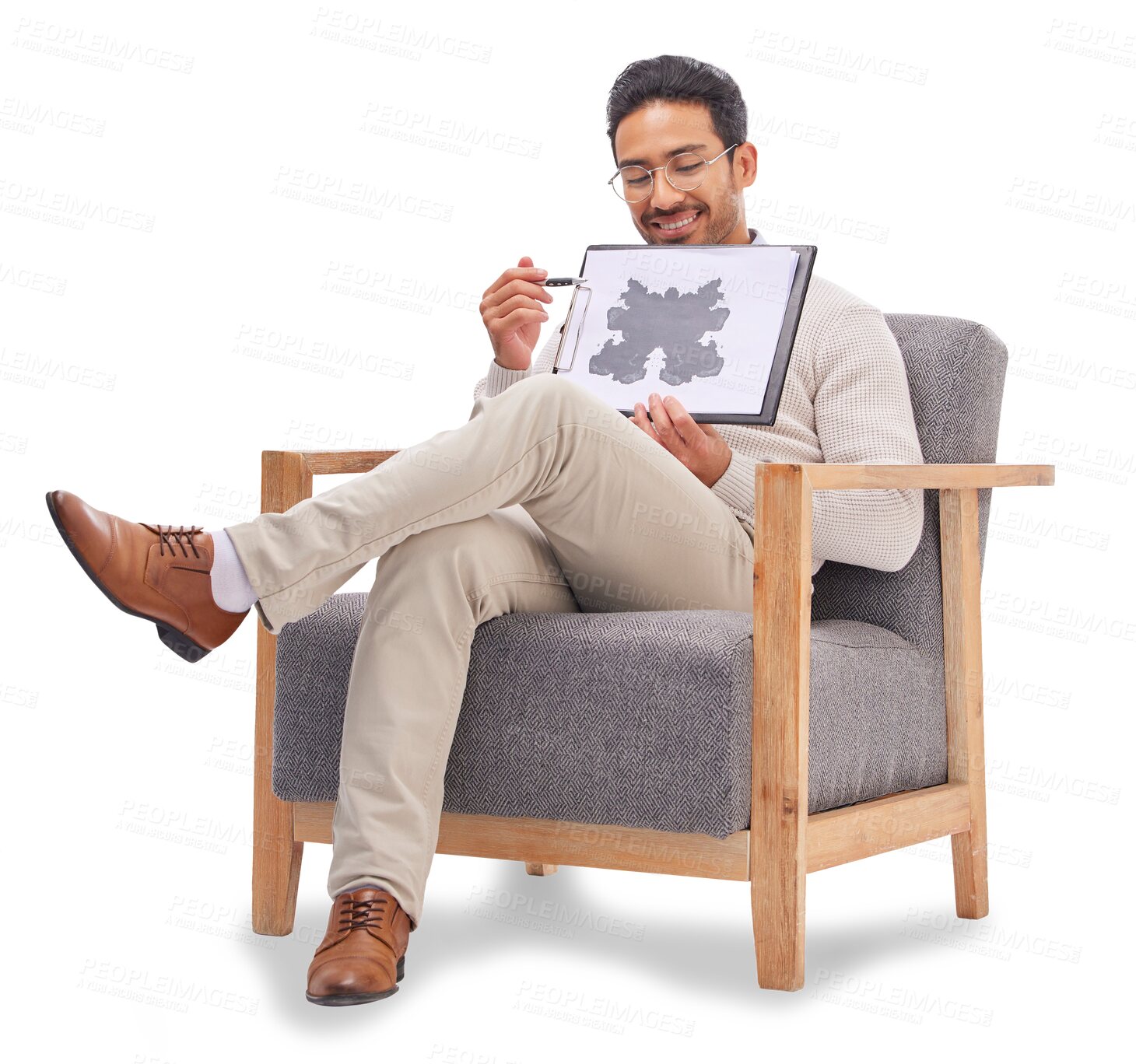 Buy stock photo Psychology, psychologist and man with rorschach test diagram on clipboard isolated on a transparent png background. Therapist, consultant or happy male sitting on chair with document for inkblot exam