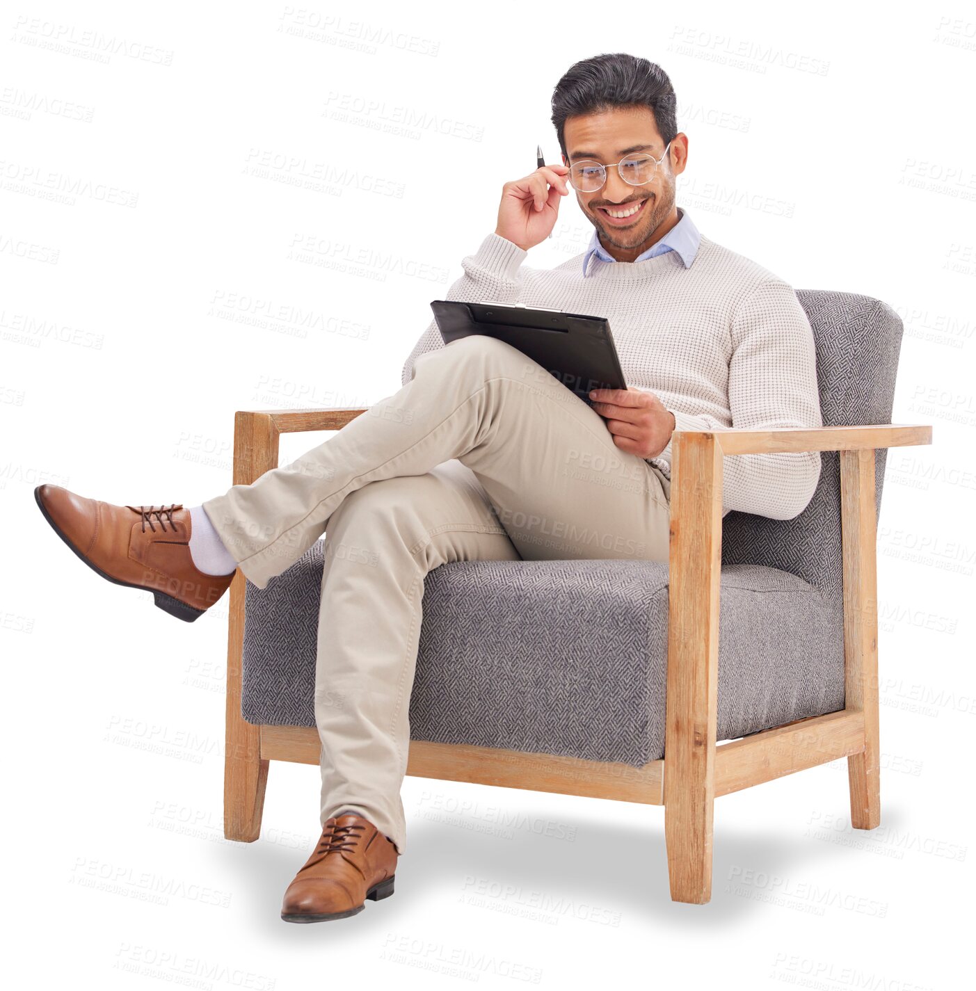 Buy stock photo Clipboard, reading and male therapist on a chair with therapy notes, checklist and review. Psychology, professional and young man psychologist relax on armchair isolated by transparent png background