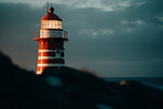 Lighthouse, cloud in sky and building for port direction. Ai generated light for sea navigation