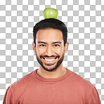 Balance, health and portrait of man with apple on head on isolated, png and transparent background for wellness. Vegan, diet and happy male person with fruit snack for nutrition, detox and vitamins