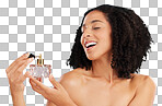Beauty, luxury and female in a studio with perfume for a fresh scent, bodycare or wellness. Happy, smile and woman model with bottle of fragrance for cosmetic health isolated by a gray background.