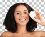 Happy woman, face and portrait smile for moisturizer, beauty or skincare against a gray studio background. Female smiling with teeth holding cosmetic product for healthy skin or soft facial treatment