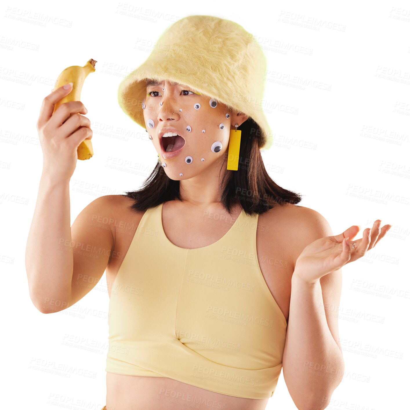 Buy stock photo Shock, surprise and young woman with banana and creative eye cosmetic stickers on skin. Fruit, phone and Asian female model with wtf face for scam or spam call isolated by transparent png background.