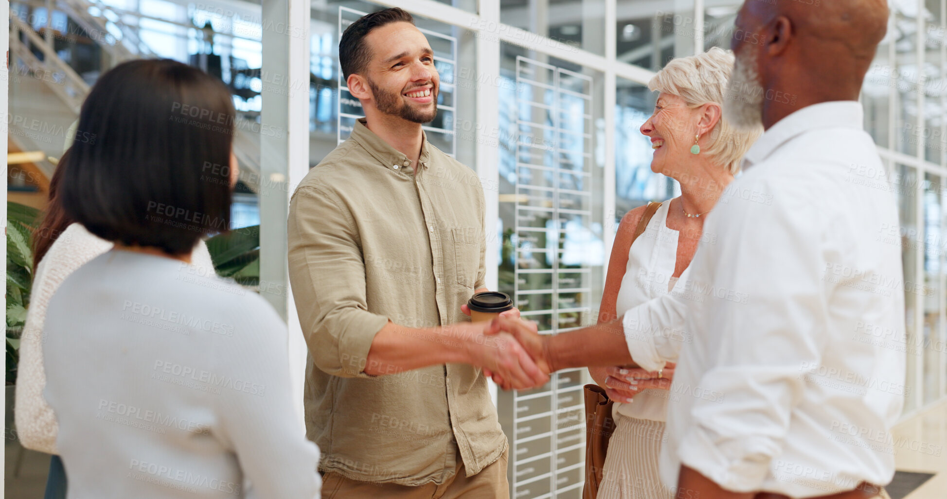 Buy stock photo Diversity, team and men handshake, welcome and partnership for collaboration, group project and modern office. Teamwork, business people and hand gesture for greeting, thank you and conversation.