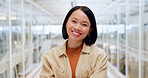 Pride, arms crossed and face of a business woman with corporate vision, success and motivation. Happy, expert and portrait of an Asian employee with a smile, confidence and empowerment at work