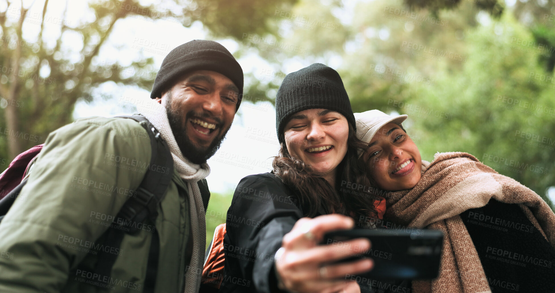 Buy stock photo Friends, happy selfie and hiking adventure in nature together,  man and women in forest for outdoor travel. Photography, smile and group of people relax on camping trip with trees, hug and memory.