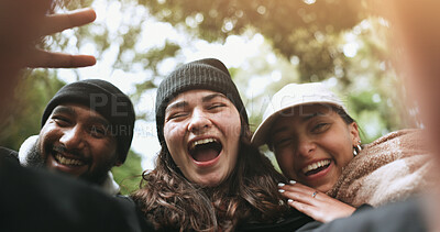 Friends, face or hikers taking a selfie while hiking outdoors in nature sharing the experience on social media. Winter, portrait or happy people take a picture or a photo while trekking together