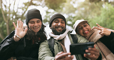 Happy friends, face or hikers taking a selfie while hiking outdoors in nature on social media or holiday. Winter, portrait or excited people take a picture or a photo on trekking adventure together