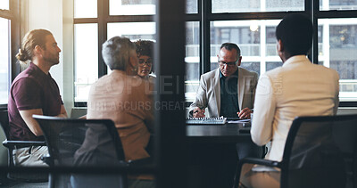 Businessman, coach and meeting in corporate discussion for teamwork strategy or ideas at the office. Senior man, CEO or executive training staff in team presentation for collaboration at conference