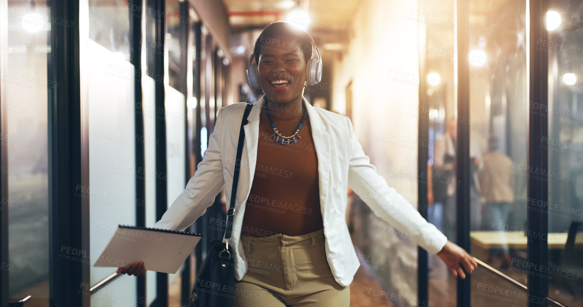 Buy stock photo Businesswoman, headphones and dance in office to music, streaming radio and audio, song and sound. Happy black woman, night shift and excited mindset for work, energy and inspiration for success