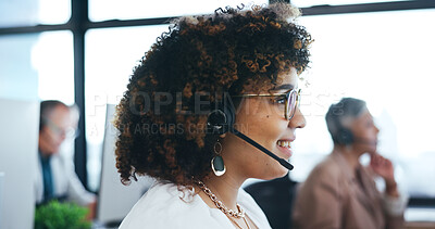 Call center, headset and a woman talking with a smile in an office for crm and support. Female consultant or agent at computer for customer service, telemarketing and contact us or help desk advice