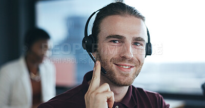 Call center, headset and a man talking at his desk in a coworking office for crm and support. Male consultant or agent at computer for customer service, account information and help desk advice