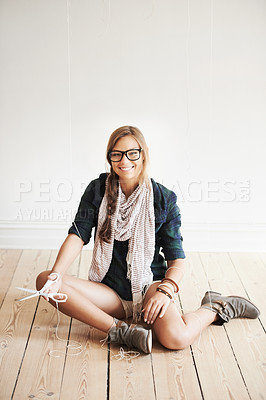Buy stock photo Scissors, portrait of happy woman and puppet strings for freedom on floor of home, house or apartment. Marionette, smile and person cut control line, rope of girl in glasses and halloween fashion