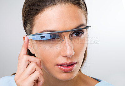 Buy stock photo Press, woman and futuristic glasses for augmented reality, metaverse or serious in studio isolated on white background. Face, cyber eyewear and smart tech, virtual or digital spectacles for vision