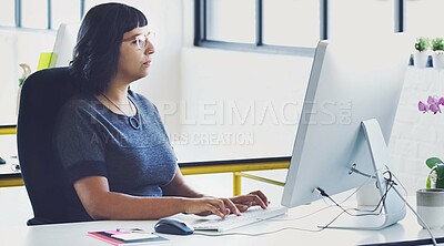 Buy stock photo Business, computer for typing and woman planning, focus and online reading for news, email and proposal for advertising campaign. Female employee, leader and manager with pc, thinking and workplace