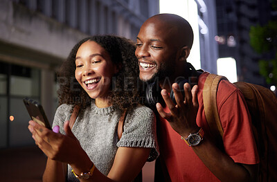 Buy stock photo Phone, meme and funny with a couple in the city at night for love, freedom or fun together. Face, social media or mobile with a black man and woman in an urban town to enjoy nightlife while bonding