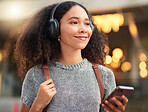 City, headphones and woman with cellphone, smile and connection with happiness, mobile app and streaming music. Outdoor, female person and happy girl with a smartphone, sound and headset with audio