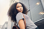 Fashion, city and portrait of woman on vacation or holiday in a travel location or urban town with a trendy backpack. Outdoor, serious and young person with cool, style and funky hair in summer
