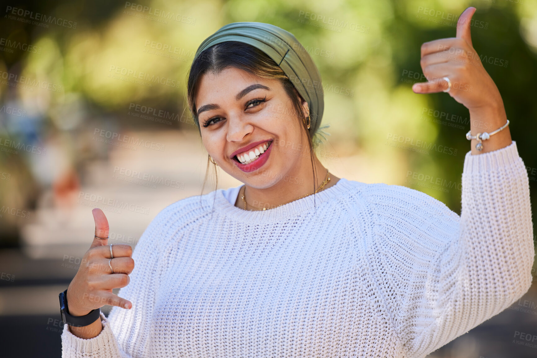 Buy stock photo Muslim, thumbs up and portrait of woman student with yes, agreement and okay gesture on university or college campus. Smile, happy and young female person with thank you sign or symbol in a park