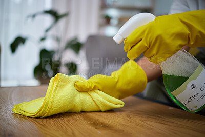 Buy stock photo Person, hands and cloth with detergent for cleaning table, housekeeping or germ and bacteria at home. Closeup of maid, cleaner or housekeeper with gloves and spray on furniture desk for clean hygiene