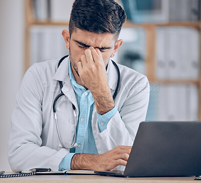 Man, doctor and headache in stress, mistake or debt from mistake, burnout or deadline at the hospital. Frustrated male person or medical employee in anxiety, depression or mental health at the clinic