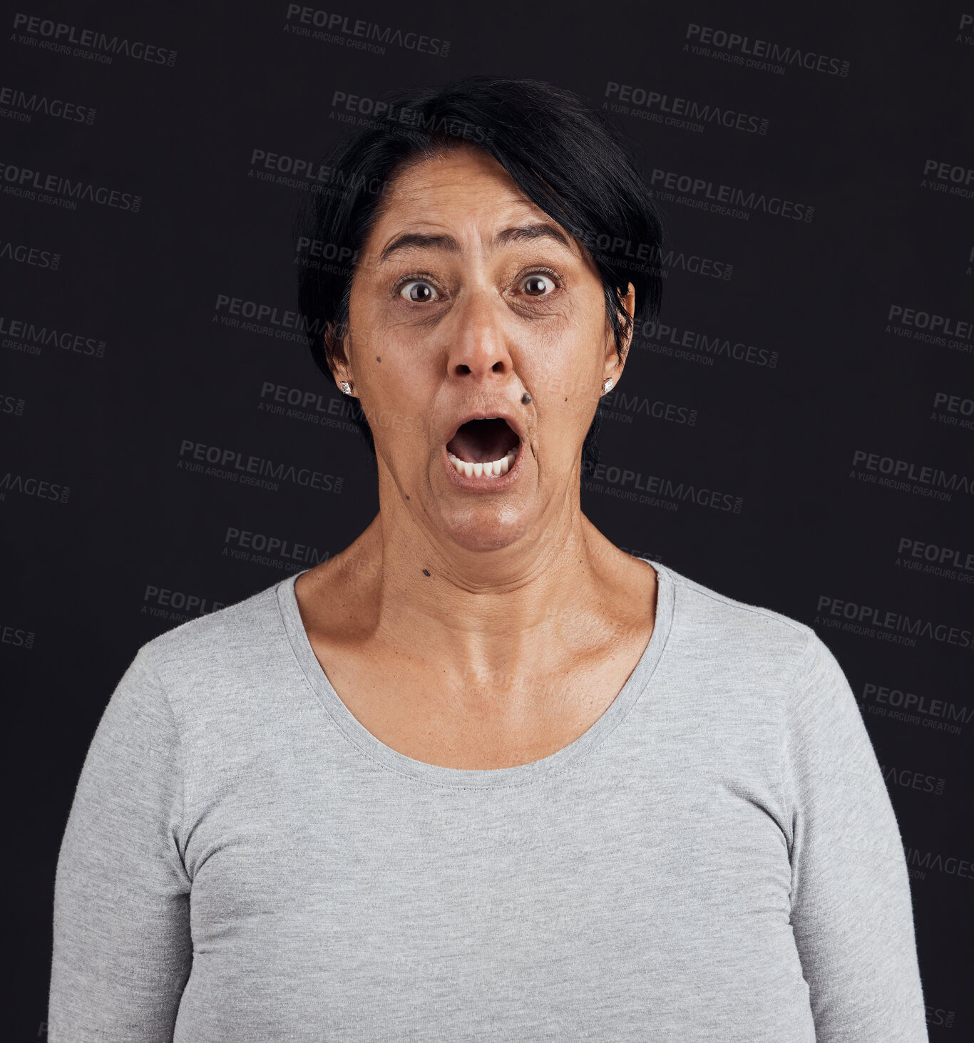 Buy stock photo Portrait, screaming and senior woman with fear, shocked and news with mental health, scared and stress, Face, elderly lady and mature model with emoji, afraid and retirement on dark studio background