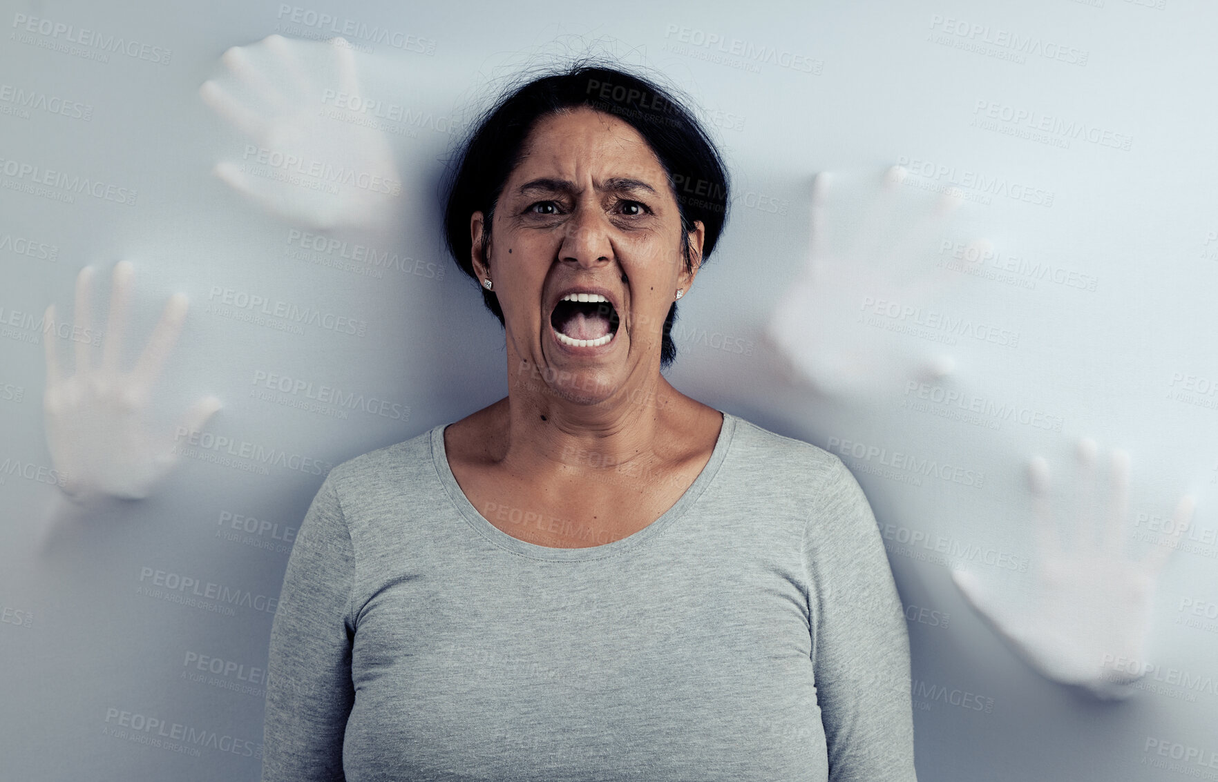 Buy stock photo Portrait, screaming and senior woman with stress, depression and frustrated with mental health or fear. Angry face, female person and model with anxiety, horror and psychology on a studio background
