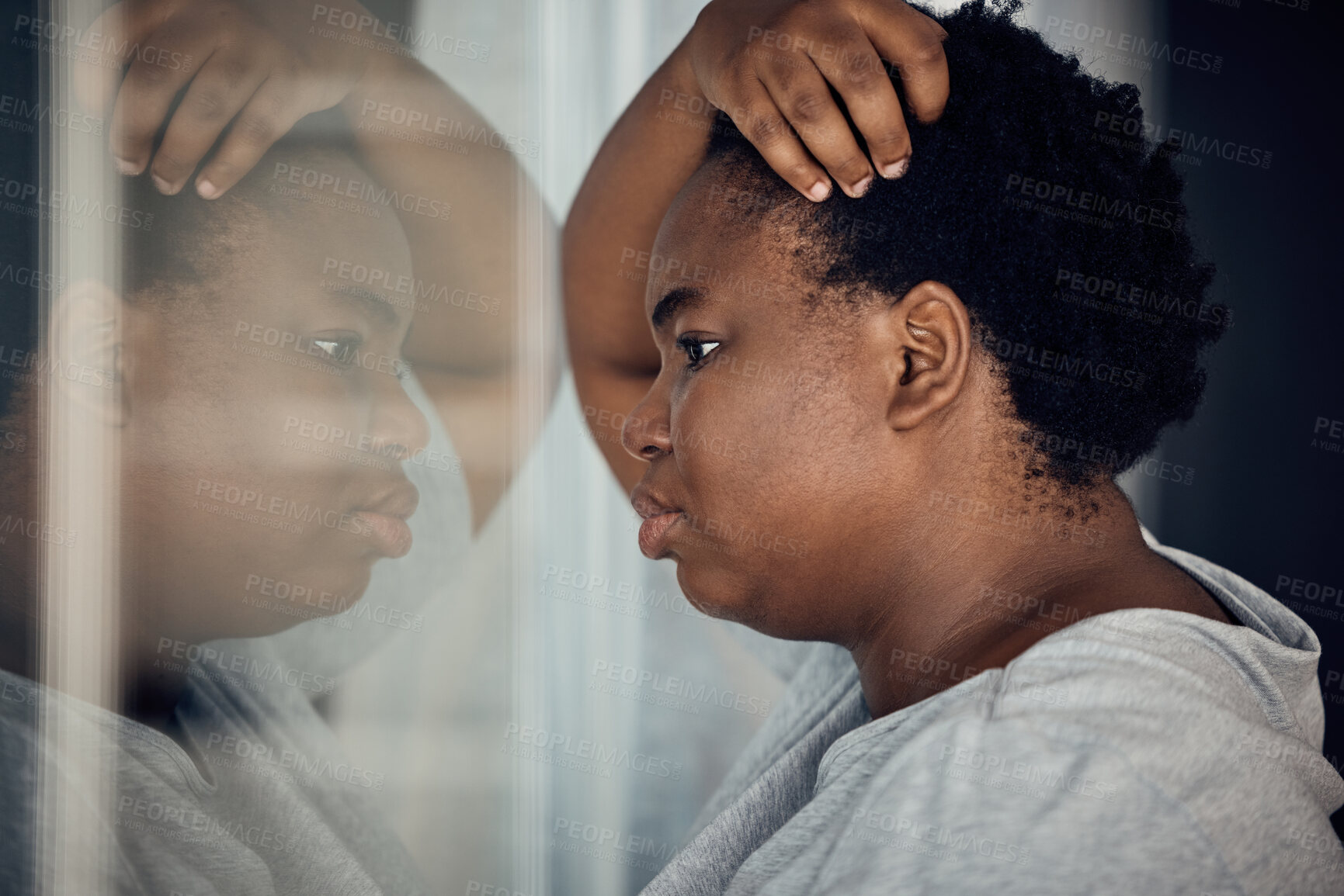 Buy stock photo Reflection, thinking and black woman with depression in a house with anxiety or a mental health idea. Window, anxiety and an African girl or person with vision of life while frustrated from a mistake
