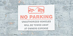 Warning, parking and stop with sign and towing icon on wall for forbidden, security and no. Transportation, prohibited and emergency with board for safety, private property and restriction banner