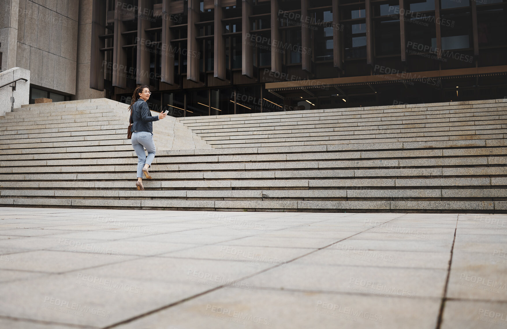 Buy stock photo Walking, city and business woman on building stairs for morning commute, journey and travel. Professional growth, worker and female person for career success, work progress and job in urban town