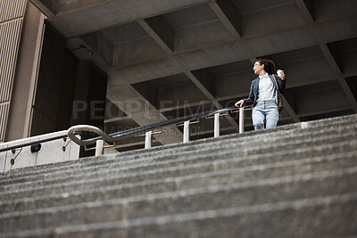 Buy stock photo Walking, coffee and business woman on stairs in city for morning commute, journey and travel. Professional, worker and female person with drink for career, work and job in urban town by building