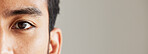 Eye banner, portrait and man for optometry, vision and mockup for healthcare advertising. Half face, closeup and person on a backdrop with space for anatomy, focus and marketing of contact lenses