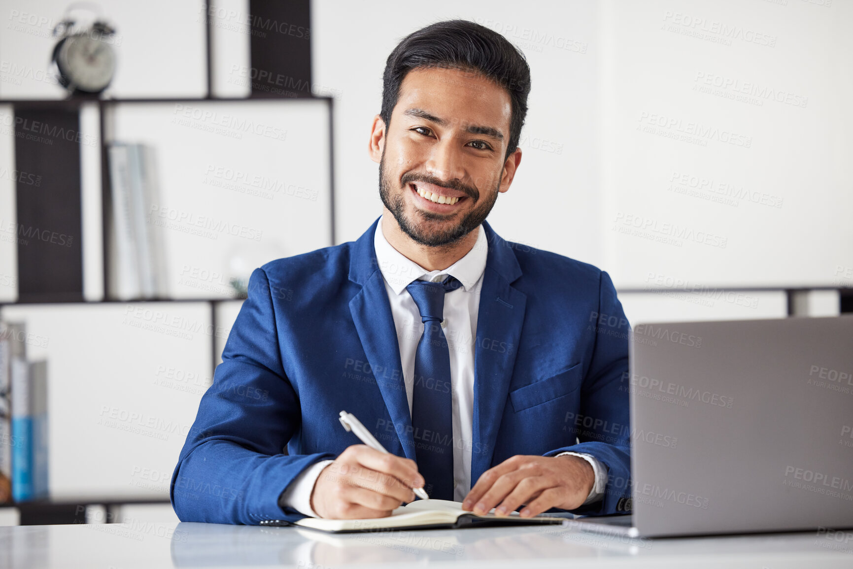 Buy stock photo Portrait, business man and writing in notebook with laptop for administration in law firm. Face of happy asian lawyer, attorney and planning in book while working on computer for legal management 