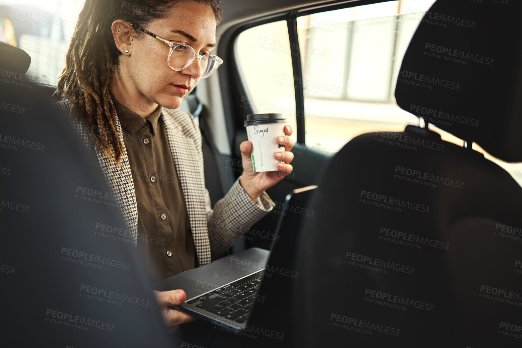 Buy stock photo Laptop, taxi travel and business woman, consultant or agent working on online research, reading information or check email. Morning commute, city transportation and professional person on car journey