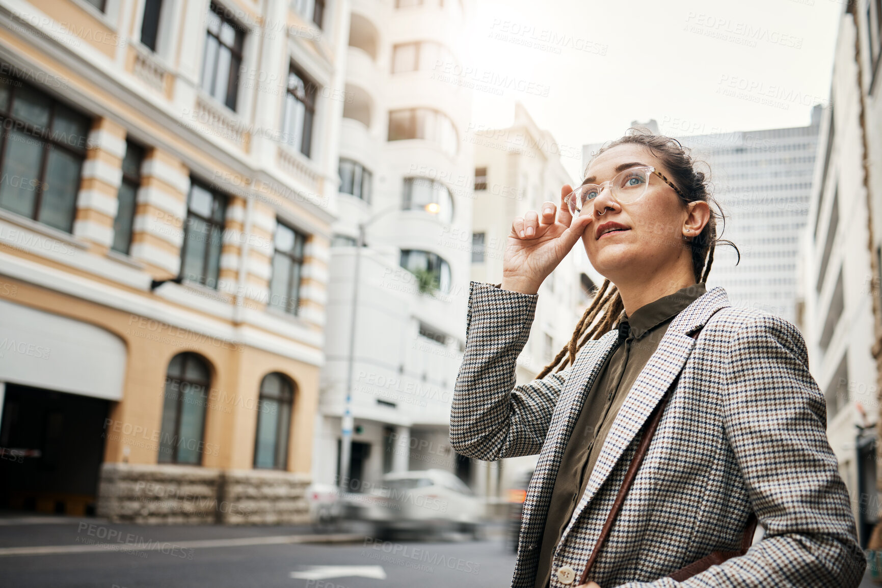 Buy stock photo Corporate woman in city, travel and commute to work with buildings, motion blur and waiting for taxi cab. Professional female person in urban street, business clothes and journey to workplace