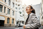 Professional woman in city, travel and commute to work with buildings, motion blur and waiting for taxi cab. Corporate female person in urban street, business clothes and journey to workplace