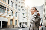 Business woman in city, travel and commute to work with buildings, motion blur and waiting for taxi cab. Corporate female person in urban street, professional clothes and journey to workplace