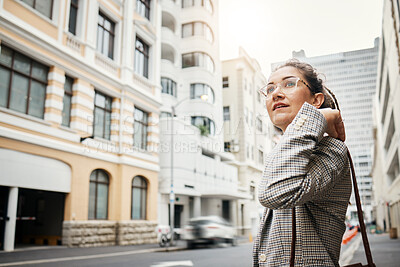 Buy stock photo Business woman in city, travel and commute to work with buildings, motion blur and waiting for taxi cab. Corporate female person in urban street, professional clothes and journey to workplace