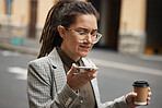 Business woman on voice message in a city to travel or commute in the morning with coffee talking to contact. Online, hipster and employee walking speaking or networking with cellphone on internet