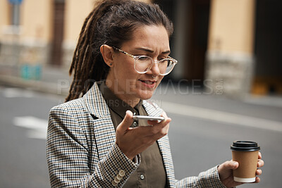 Buy stock photo Business woman on voice message in a city to travel or commute in the morning with coffee talking to contact. Online, hipster and employee walking speaking or networking with cellphone on internet