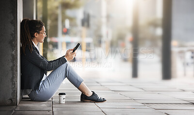 Buy stock photo Phone, woman and coffee break in the city, street or job search, employment or network on social media, internet or online. Unemployed, worker sitting and reading news or wanted ads on cellphone 
