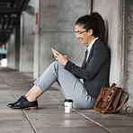 Happy, woman and reading phone on coffee break in the city, street or employee relax on social media, internet or online. Working, smile and sitting with meme, blog or email on smartphone in town