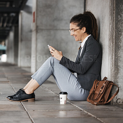 Buy stock photo Happy, woman and reading phone on coffee break in the city, street or employee relax on social media, internet or online. Working, smile and sitting with meme, blog or email on smartphone in town