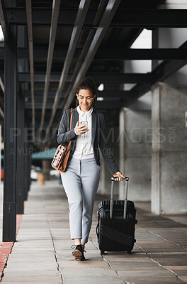 Buy stock photo Phone, travel and suitcase with a business woman walking in an airport parking lot outdoor in the city. Mobile, luggage and commute with a young female employee on an international trip for work