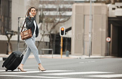 Buy stock photo Business, travel and phone call by woman with luggage in city street for networking or work trip. Smartphone, conversation and lady on road crosswalk with suitcase for traveling appointment in London
