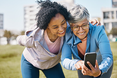 Buy stock photo Senior woman, friends and outdoor with phone or social media, blog or reading post about workout, exercise and walk in park. Elderly person, people and check profile picture together on screen