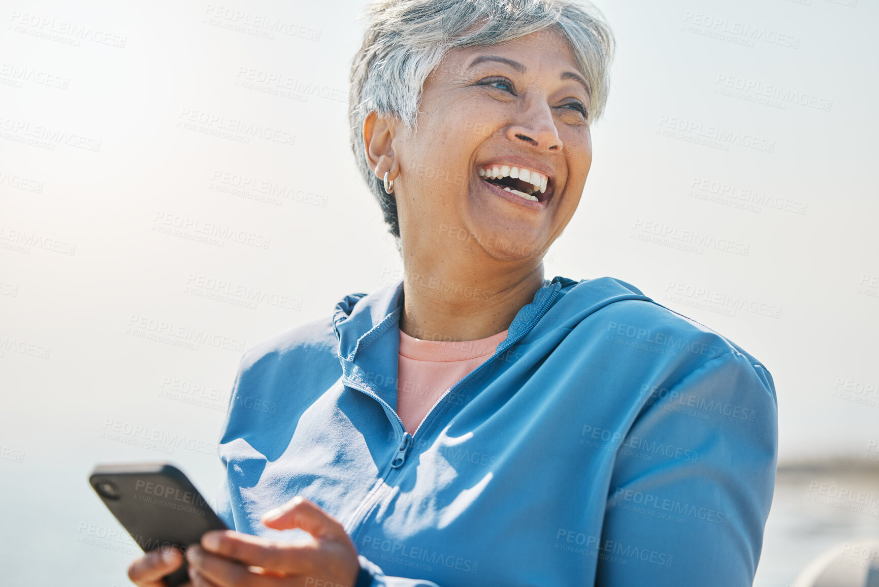 Buy stock photo Happy, funny and fitness with old woman and phone for running, workout and social media. Network, communication and contact with female runner laughing in nature for technology, sports and mobile app