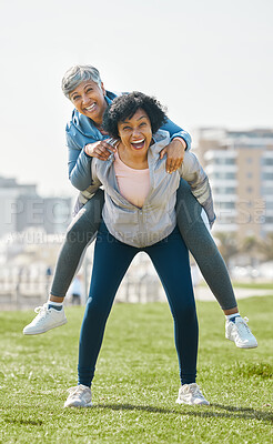 Buy stock photo City, funny and senior women piggyback together playing, crazy and funny with as friends for outdoor exercise. Health, wellness and portrait of crazy elderly people bonding and laughing after workout