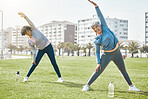 Women, senior and stretching outdoor, exercise and wellness with flexibility and start workout in park. Female people, friends with pilates or running in nature, training and fitness with vitality